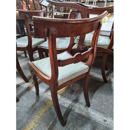 506 - A set of six Georgian mahogany dining chairs. Featuring scallop shell carved motif to backrest and r... 