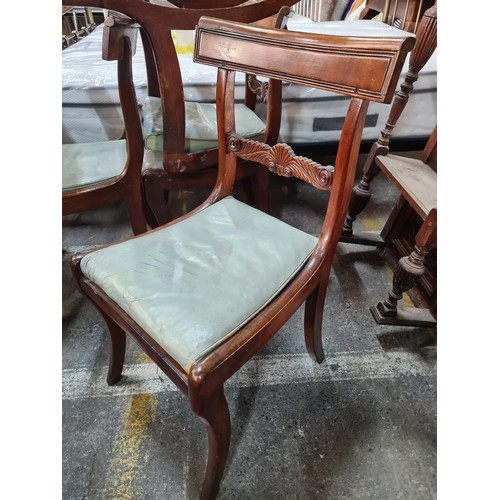 506 - A set of six Georgian mahogany dining chairs. Featuring scallop shell carved motif to backrest and r... 