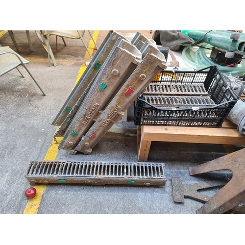 334 - A large crate of cast iron French drain grates along with six inground drains. 
MM: L50 x W13 cm eac... 