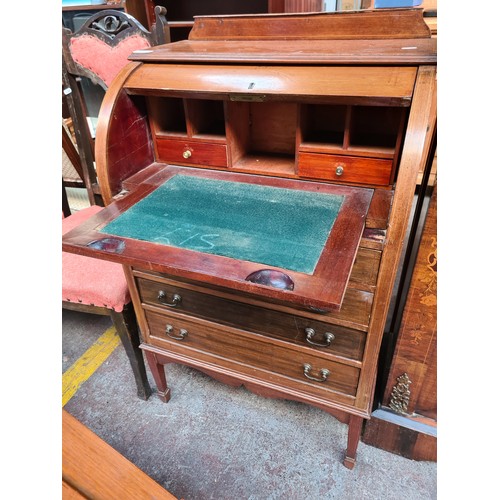 391 - Star lot : An elegant Edwardian ladies writing roll top desk with a pull out writing surface with fl... 