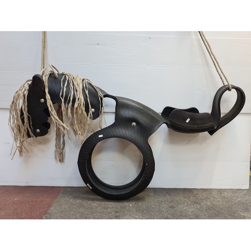 314 - A really striking, handcrafted Horse sculpture forming a robust child’s swing  Crafted from recycled... 