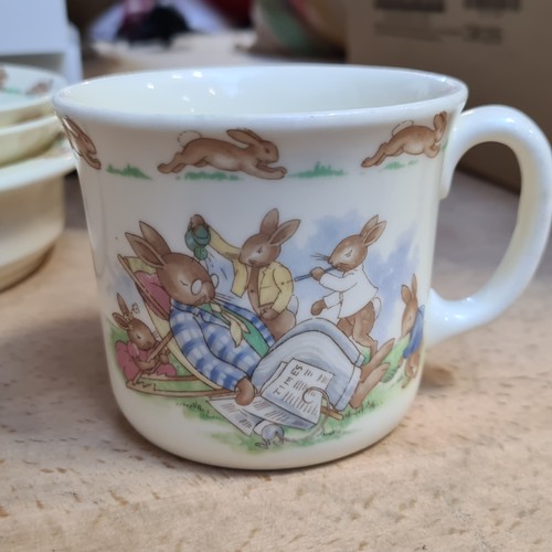 350 - Star Lot : 21 pieces of Royal Doulton ceramic ware in the Bunnykins pattern, beautifully illustrated... 