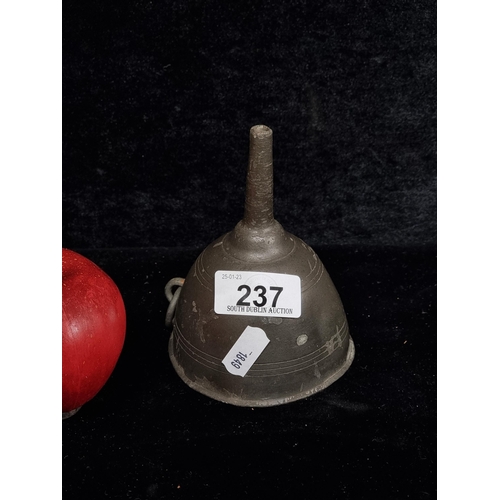237 - A Georgian metal wine funnel with spout and ring for securing.