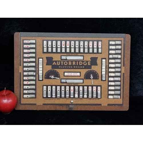 243 - A vintage Autobridge Playing Board made in the U.S.A. featuring a lift-up top panel with metal slide... 