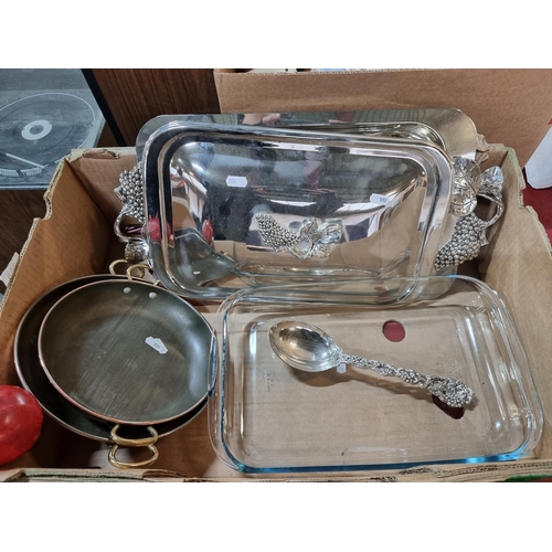 Several Large EPNS trays, A very large prexies lasagne dish and tow metal serving dishes with two handles
