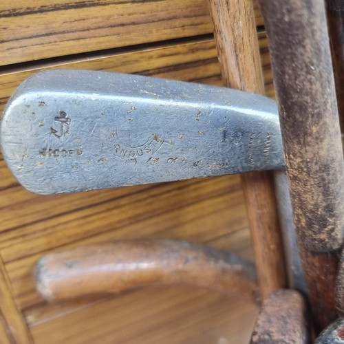 337 - Eleven antique hickory shafted golf clubs including irons, wedges and putters. Come with original pe... 