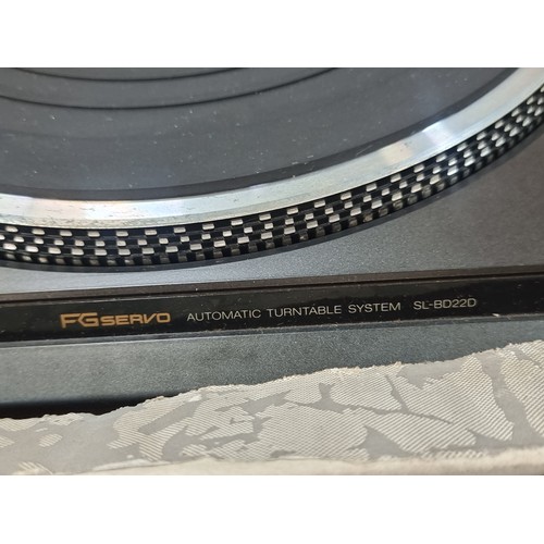 566 - A Technics automatic turntable record player in original packaging (model no: SL-BD22D). Needle inta... 