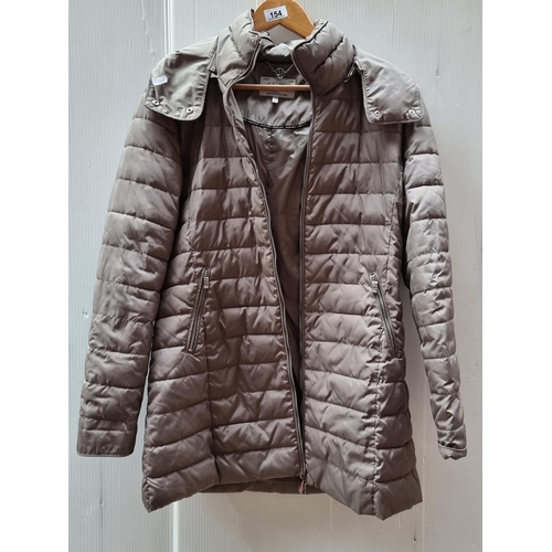 154 - A lovely ladies quilted jacket by designer brand Armani Jeans. Designed in a warm grey tone with pol... 