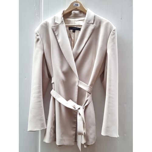 156 - A supremely elegant ladies long blazer by designer brand Helen McAlinden. Designed with a wrap closu... 