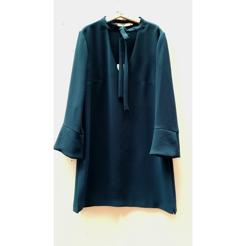 162 - A beautiful and brand new ladies' long blouse in a stunning shade of sea green by the French designe... 