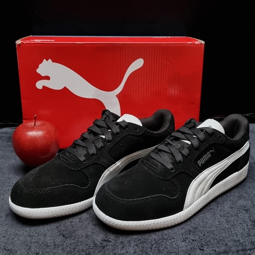 199 - A pair of brand new Puma soft foam sneakers in black suede with white leather detail. Never worn, in... 