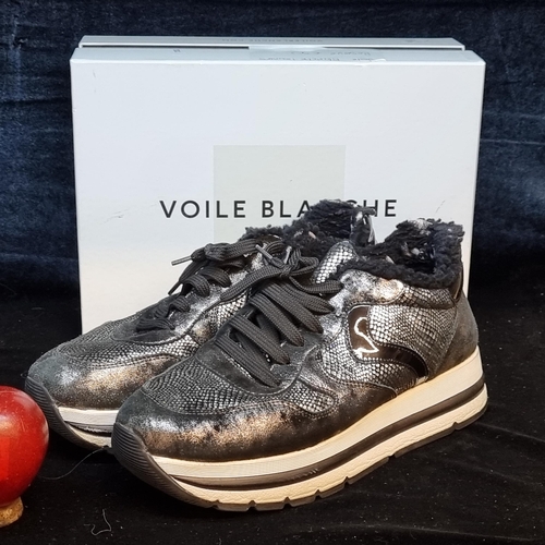 90 - A pair of designer ladies platform trainers by Voile Blanche. Designed in a metallic silver on black... 