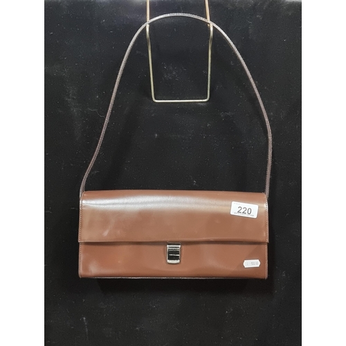 220 - An extremely stylish ladies handbag by designer brand Furla. This is a fabulous vintage inspired sil... 