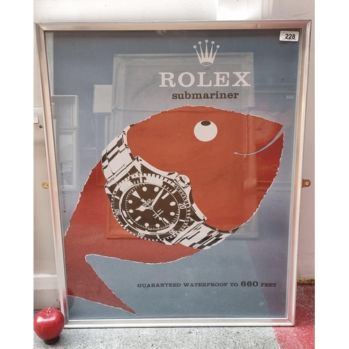 228 - A large print of a vintage advertisement for Rolex Watches reading guaranteed waterproof to 660 feet... 