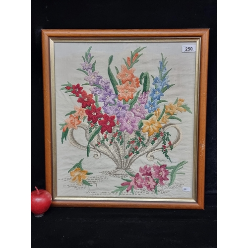 250 - A charming original vintage embroidery piece featuring a bountiful bouquet of flowers in a neoclassi... 