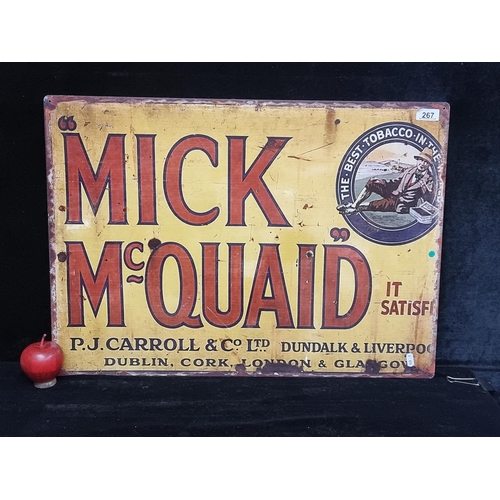 267 - A metal advertisement for Mick McQuaid tobacco.