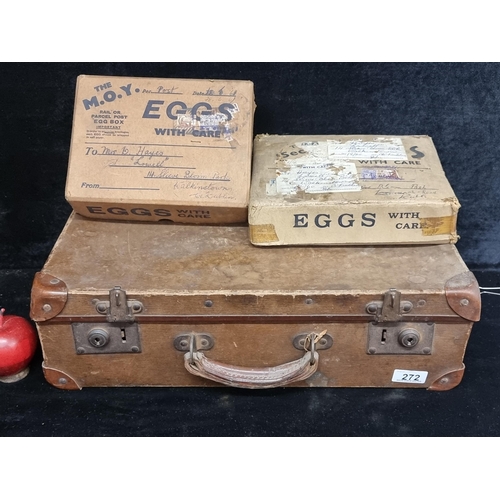 272 - A vintage card briefcase with leather corners containing to vintage Irish egg boxes for postal deliv... 