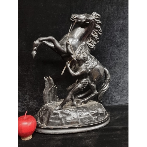 273 - An excellent large antique spelter figure of the Marly Horses group figure after French sculptor Gui... 