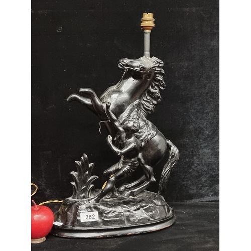 282 - An excellent large  antique spelter lamp base of the Marly Horses group figure after French sculptor... 