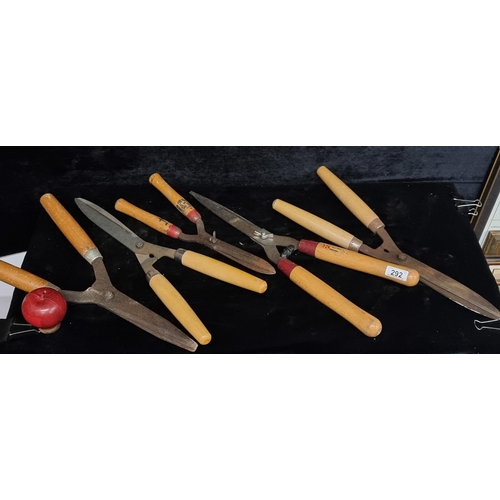 292 - A good lot of five garden shears with wooden handles including an example from Kamaki.