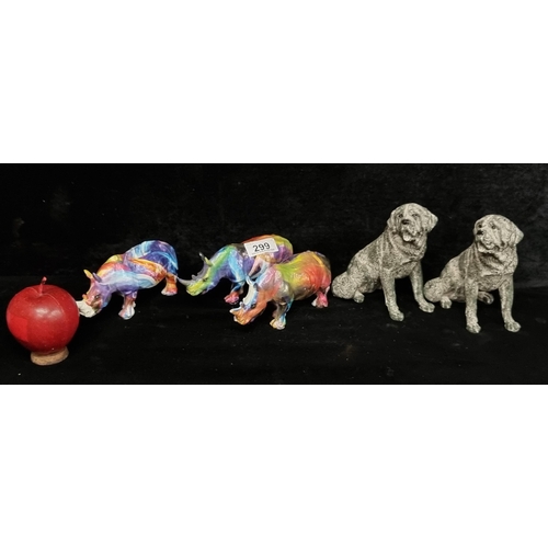 299 - A lot of five sculptural pieces, including a pair of hounds three rhino figures painted in a vibrant... 