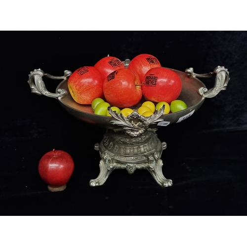 315 - An incredibly heavy pewter pedestal fruit bowl with elaborate detail by way of curved handles, laure... 