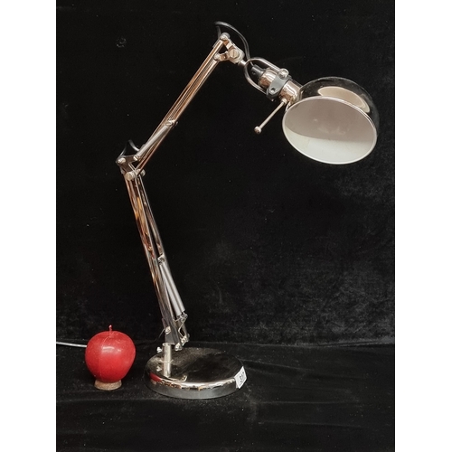 317 - A fantastic example of a sleek chrome articulated desk lamp with a dome shade and fully swivelled bo... 