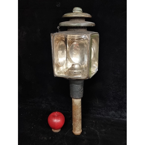 319 - A fantastic example of an antique carriage lamp with cast iron frame and complete with two bevelled ... 