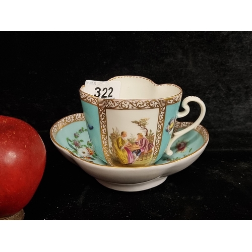 322 - A wonderful 19th century Dresden porcelain cup and matching saucer both of the quatrefoil form and f... 