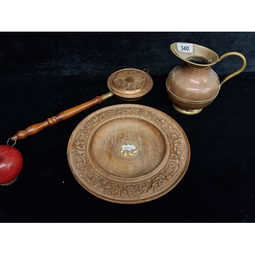 340 - Three beautiful homeware items comprising of a copper bed warmer with wooden handle along with a cop... 