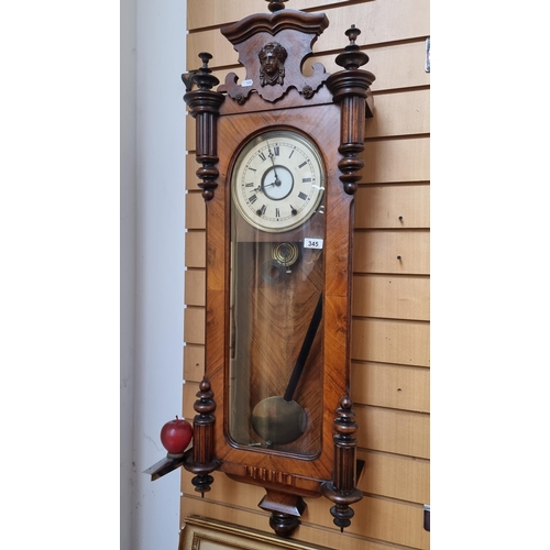 345 - Star Lot : A very handsome example of a large rectangular 8-day wall clock housed in a wooden case w... 