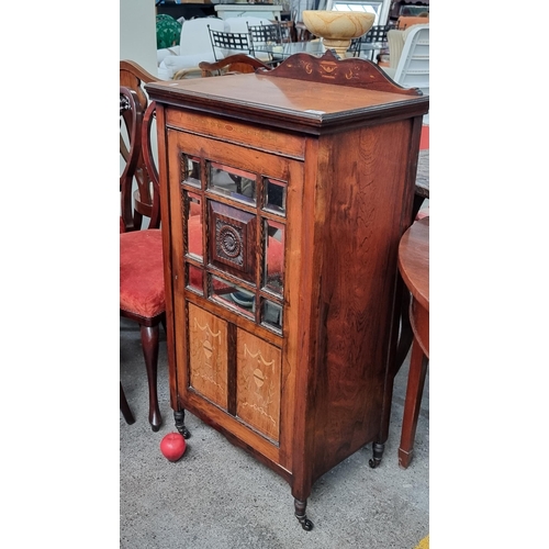 621 - Star Lot: A stunning antique Edwardian rosewood music cabinet featuring beautiful marquetry in the f... 