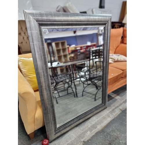 675 - Star lot : A magnificent and very large rectangular bevelled wall mirror set into a wooden frame wit... 