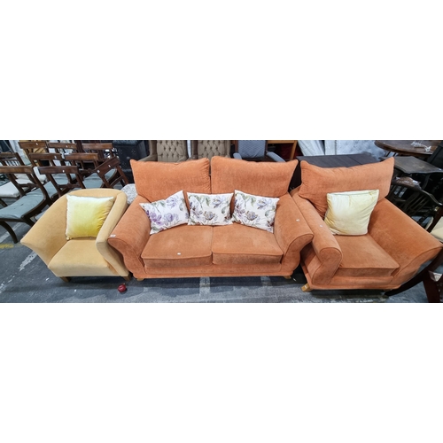 676 - Three good pieces of furniture including a very cheerful orange two seater sofa and matching armchai... 