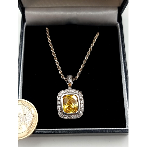 695 - An attractive Citrine and gem stone pendant necklace, accompanied by a heavy sterling silver twist c... 