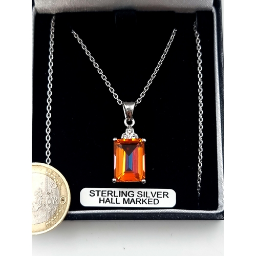 699 - A facet cut tangerine topaz stone pendant necklace, set with a sterling silver chain. Length: 46cm. ... 