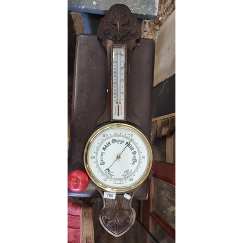 785 - A large very handsome English made vintage barometer, in a wonderful banjo shaped case with beautifu... 