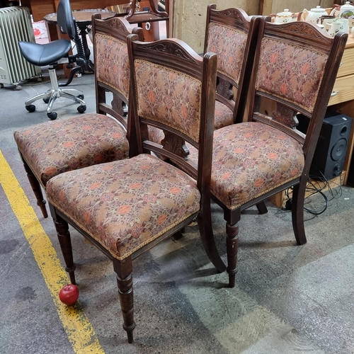 834 - Four beautiful mahogany dining chairs with carved detail and upholstered in a orange and purple fabr... 