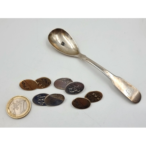 842 - A selection of sterling silver consisting of two pars of cufflinks and a teaspoon. Weight 30.33