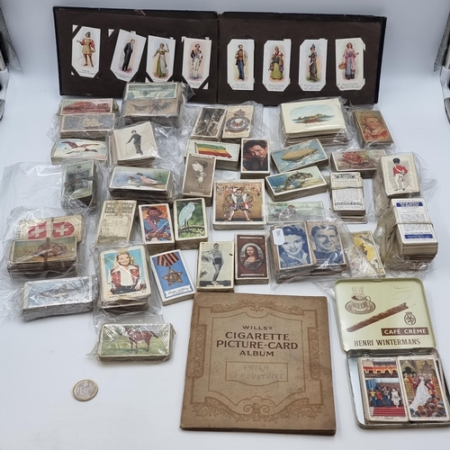 843 - A very large and comprehensive collection of vintage cigarette cards. Of particular interest if a Wi... 