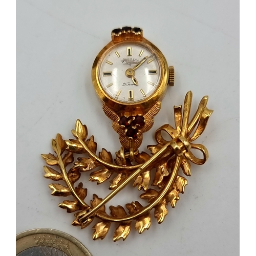 844 - A beautiful vintage watch fob brooch in 9ct gold. A very pretty example with foliate and floral swag... 