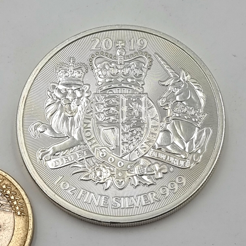 846 - A Queen Elizabeth 2 pound one ounce fine silver coin, circa 2019.  In mint condition.