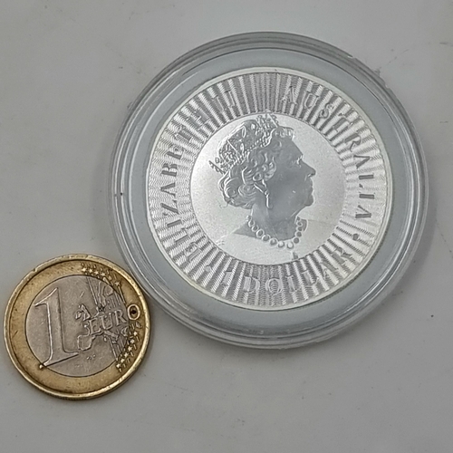 849 - An Australian One dollar one ounce fine silver coin, dated 2019. In mint condition.