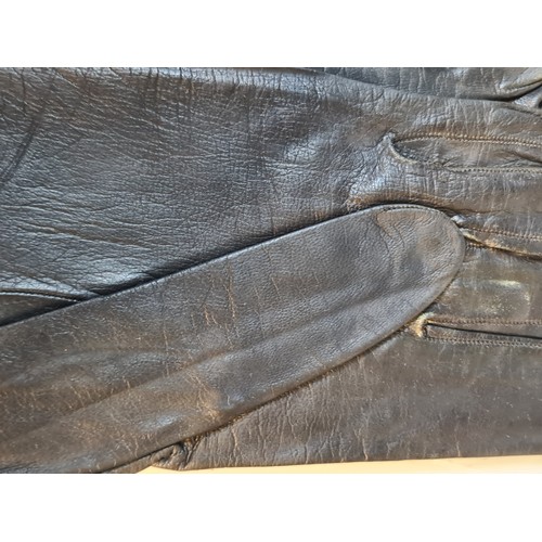 70 - A handsome pair of Christian Dior vintage genuine black leather women's gloves. Stamped to interior.... 