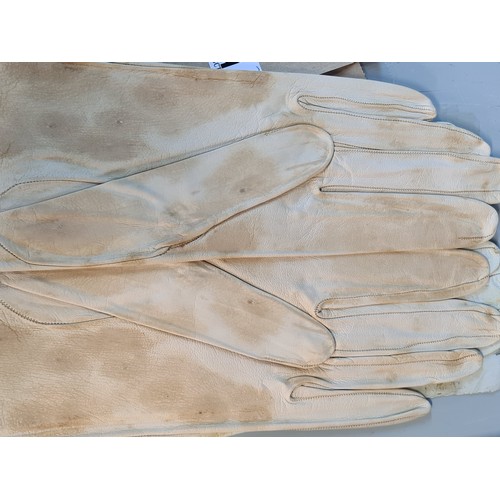 71 - Two pairs of light cream genuine leather Christian Dior women's gloves, stamped to interior. With or... 