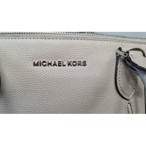 79 - Star Lot : A genuine leather ladies handbag in the Sierra series by designer brand Michael Kors. An ... 