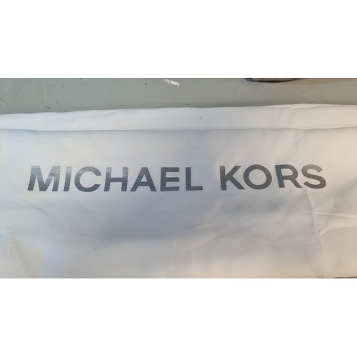 79 - Star Lot : A genuine leather ladies handbag in the Sierra series by designer brand Michael Kors. An ... 