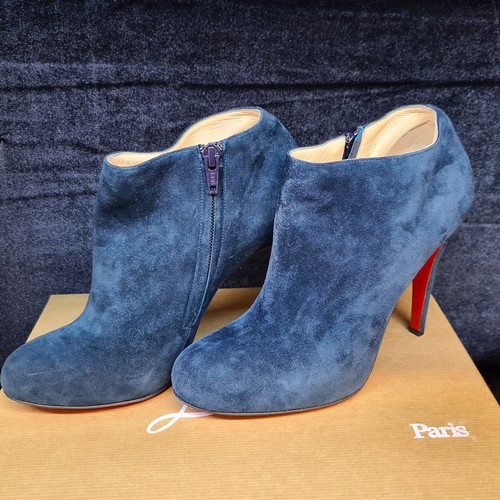 81 - Star Lot : A pair of designer ladies heeled ankle boots by Famous designer Christian Louboutin in th... 