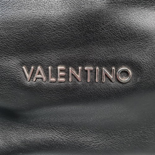 82 - A beautiful ladies handbag by designer brand Valentino. A stylish drawstring example in black with p... 