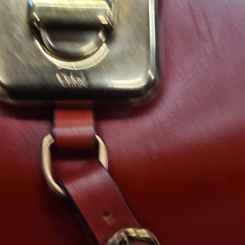 83 - Star Lot : A fabulous designer ladies handbag by Chloé brand. Designed in a scarlet red soft box cal... 